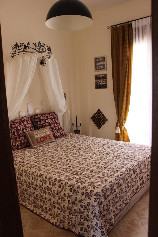 Postel nebo postele na pokoji v ubytování Siviri Apartment in Blu