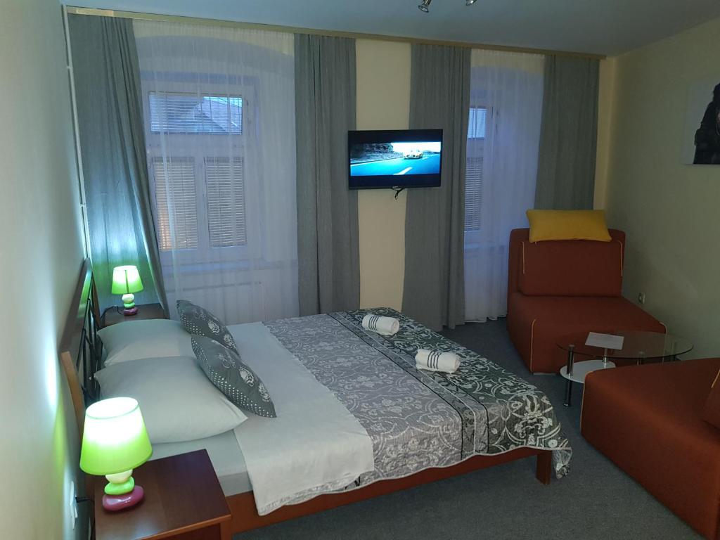 Postel nebo postele na pokoji v ubytování ELG Rooms