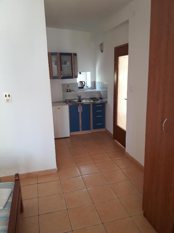 Kuchyň nebo kuchyňský kout v ubytování Apartments Vretenicic