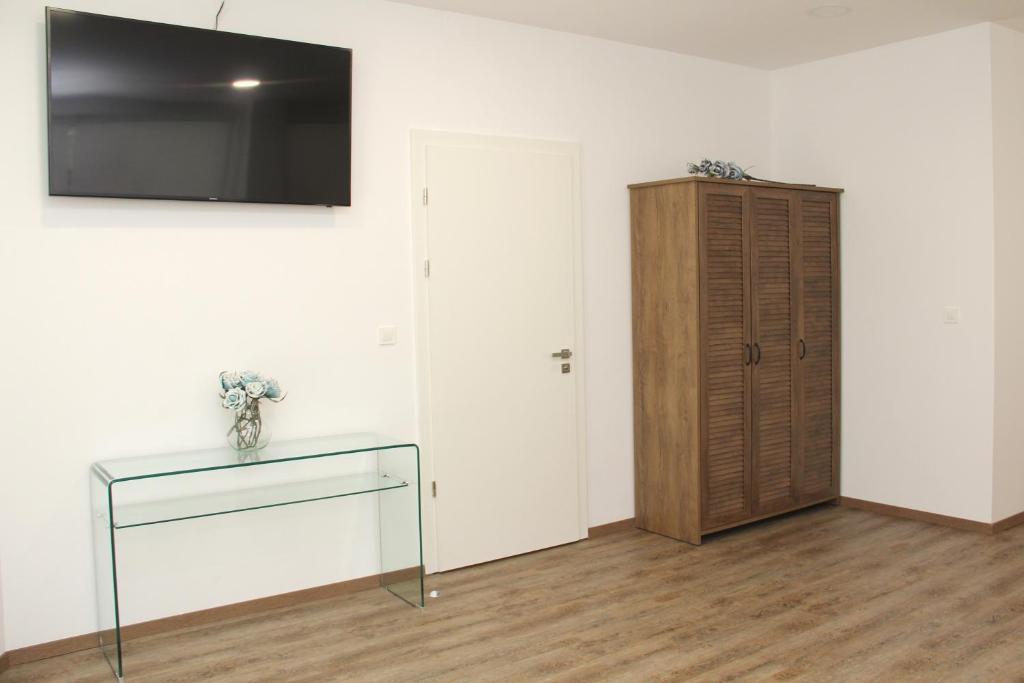 TV a/nebo společenská místnost v ubytování Maja Apartment