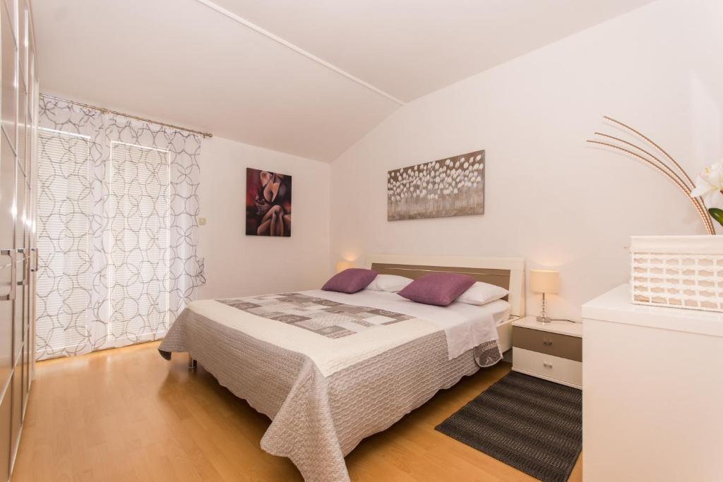 Posteľ alebo postele v izbe v ubytovaní Apartments Barba