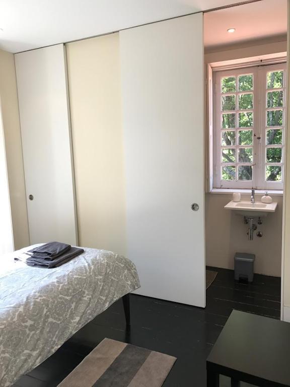 Postel nebo postele na pokoji v ubytování Camelia Rooms
