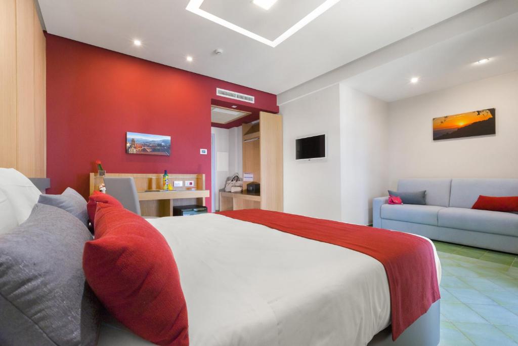 A bed or beds in a room at Hotel O Sole Mio