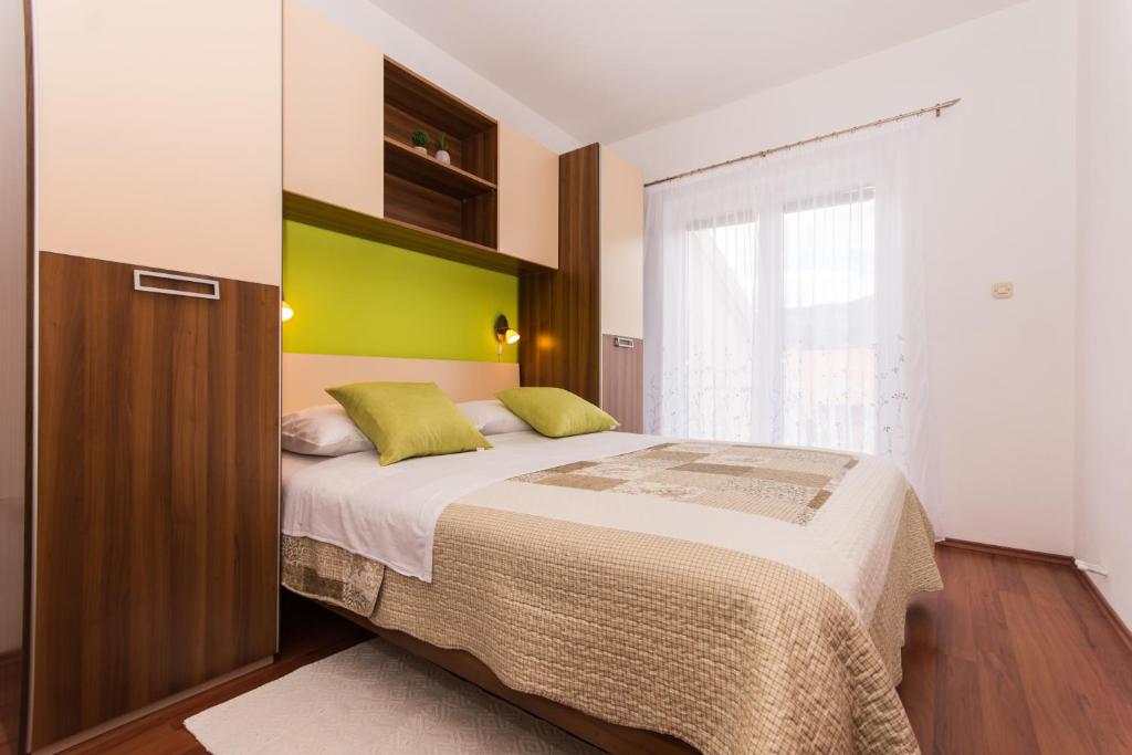 Posteľ alebo postele v izbe v ubytovaní Apartments Barba