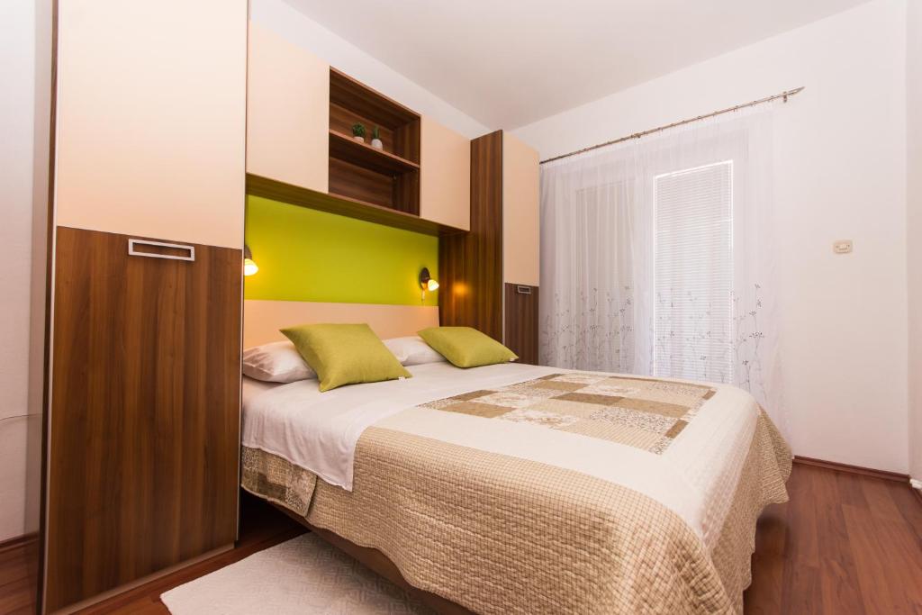 Posteľ alebo postele v izbe v ubytovaní Apartments Barba