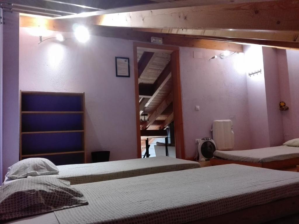 Postel nebo postele na pokoji v ubytování Refugi Casa Canelo