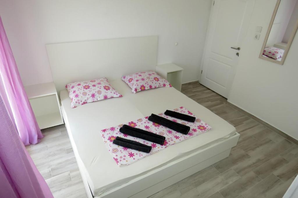Postel nebo postele na pokoji v ubytování Lux Dalmatia I & R
