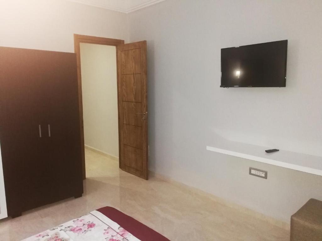 TV a/nebo společenská místnost v ubytování London House