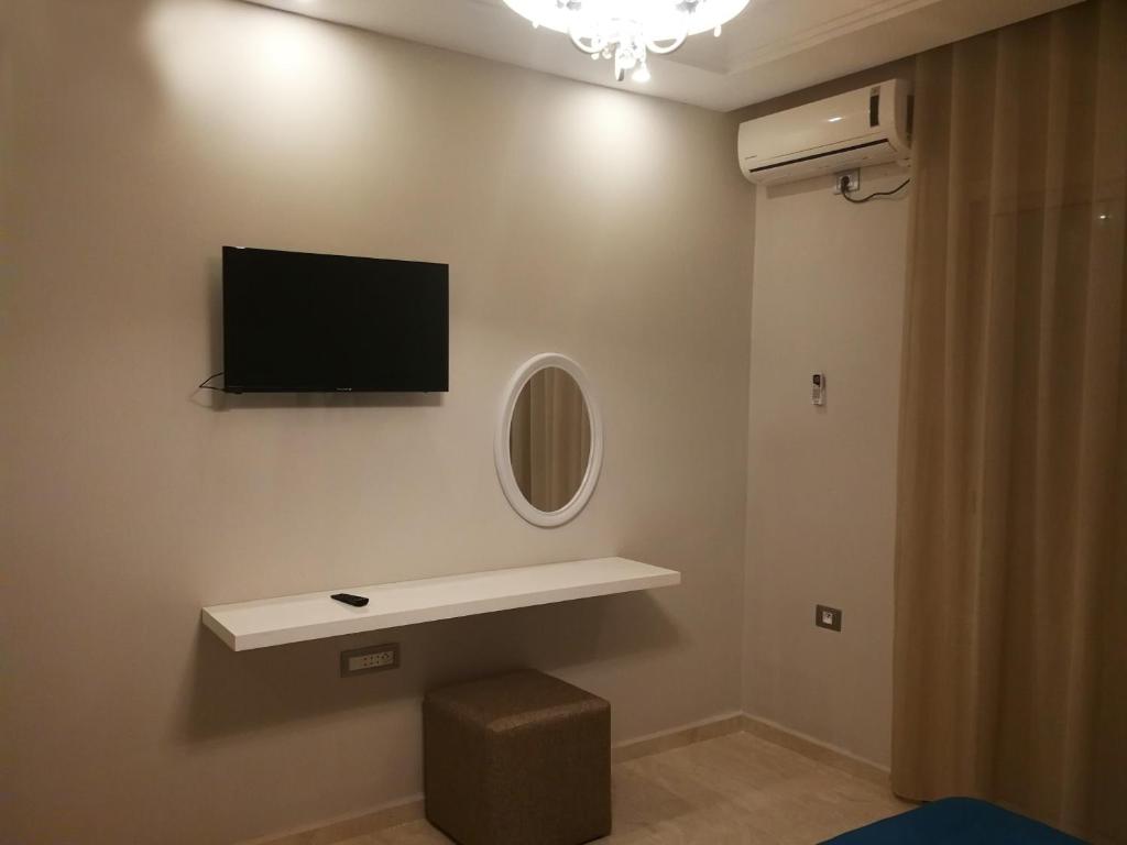 TV a/nebo společenská místnost v ubytování London House