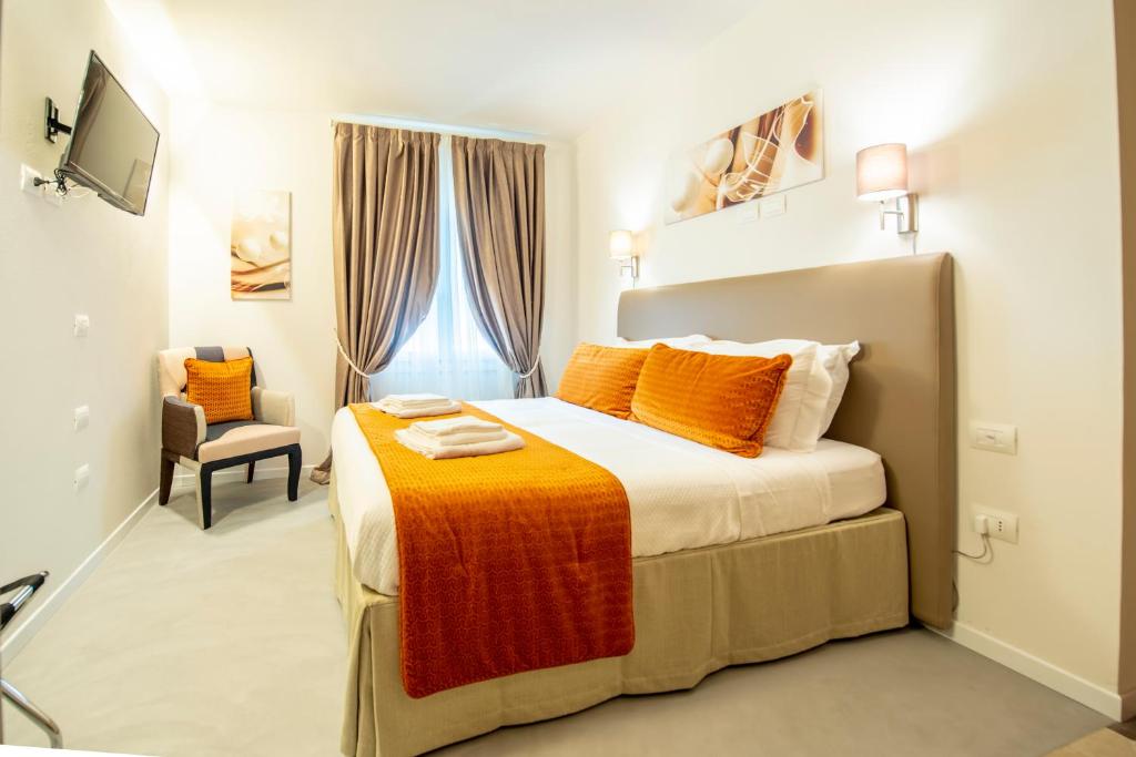 Ένα ή περισσότερα κρεβάτια σε δωμάτιο στο Casa Ercoli B&B