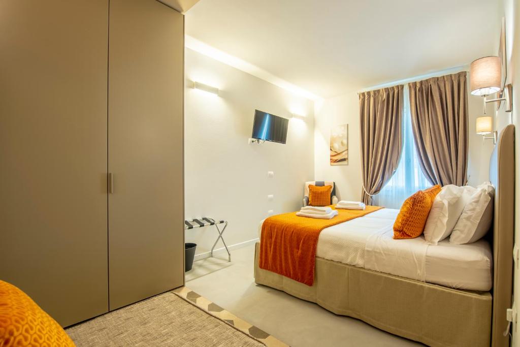 Postel nebo postele na pokoji v ubytování Casa Ercoli B&B