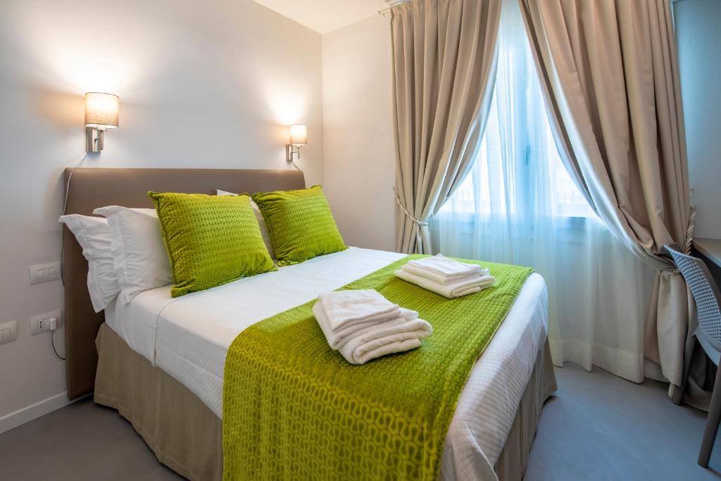 Postel nebo postele na pokoji v ubytování Casa Ercoli B&B