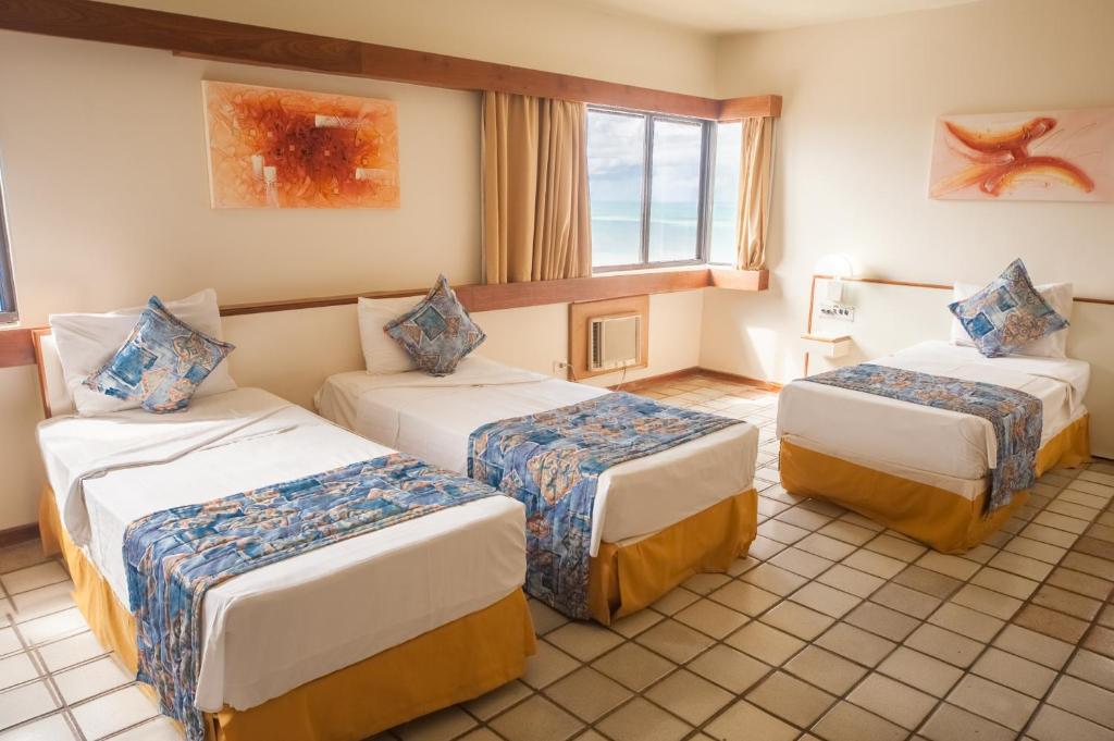 Cama ou camas em um quarto em Hotel Dan Inn Mar Piedade - Grande Recife By Nacional Inn