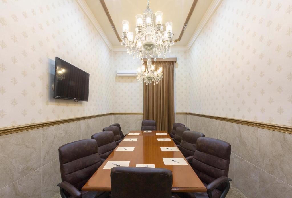 TV a/nebo společenská místnost v ubytování Hotel Victoria Merida