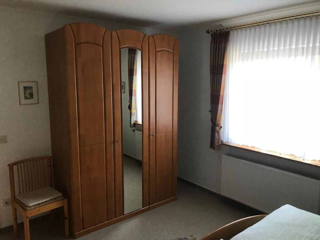 Postel nebo postele na pokoji v ubytování Haus Mittelberg