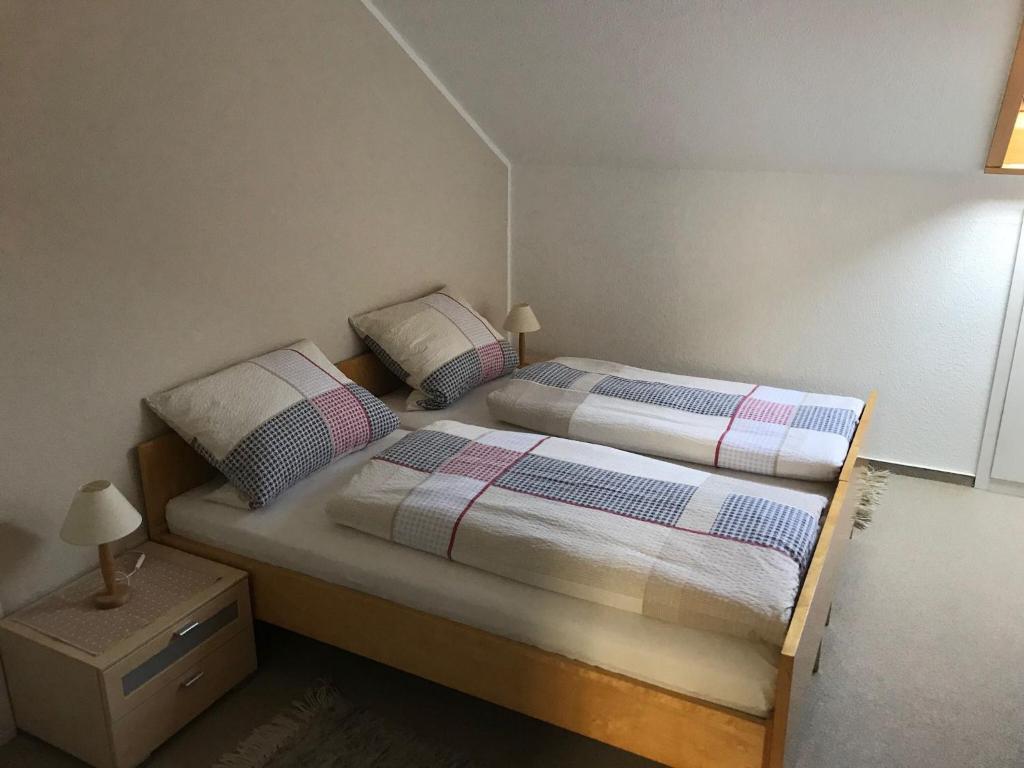 Postel nebo postele na pokoji v ubytování Haus Mittelberg