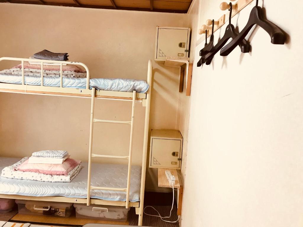 Palanda nebo palandy na pokoji v ubytování IM guest house