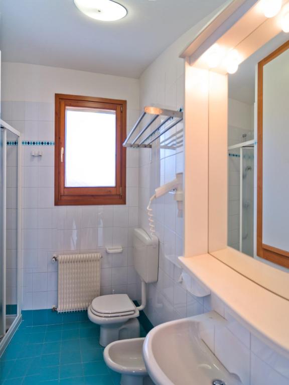 Ванная комната в Villaggio Mare Blu