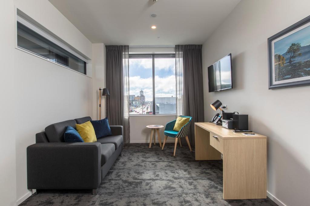 TV a/nebo společenská místnost v ubytování Quest on Manchester Serviced Apartments