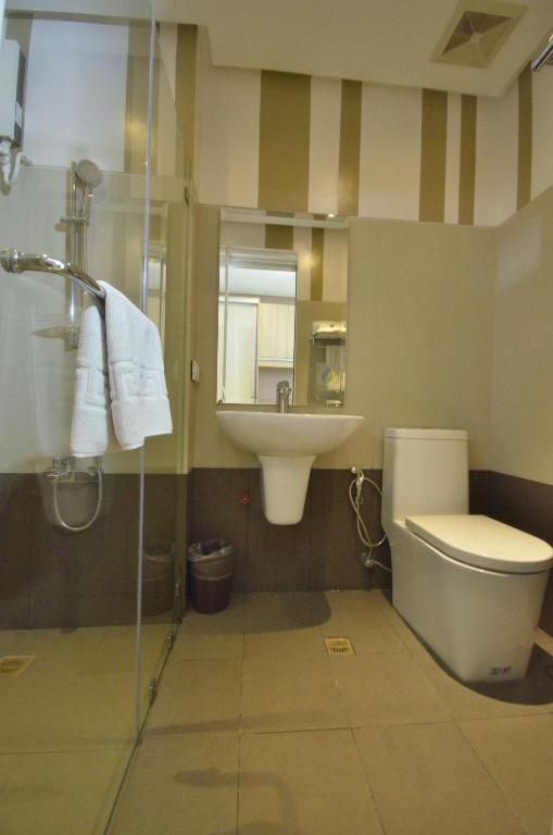 Koupelna v ubytování Injap Tower Hotel