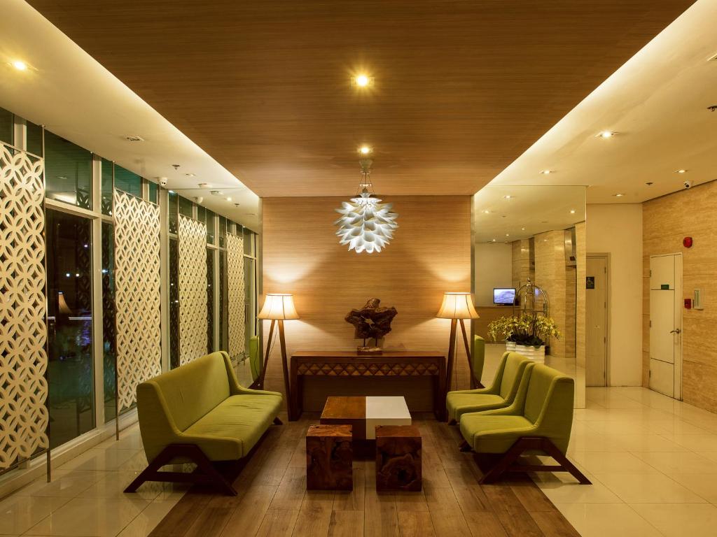 Posezení v ubytování Injap Tower Hotel