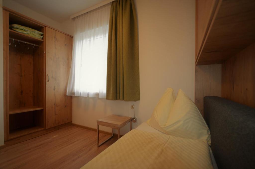 Posteľ alebo postele v izbe v ubytovaní Appartements-Pension Lindenheim