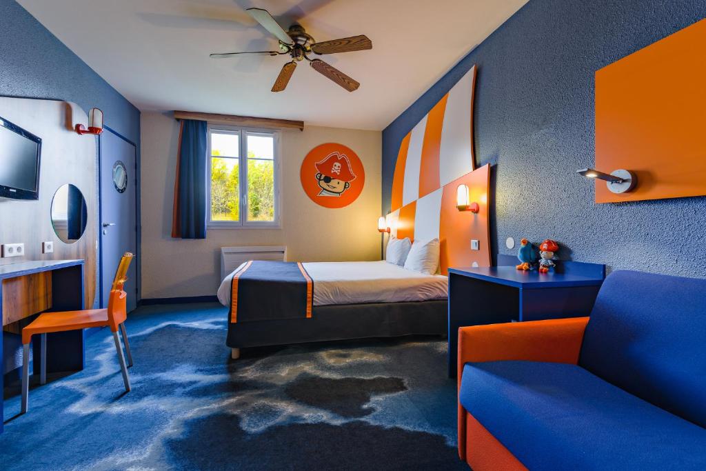 TV o dispositivi per l'intrattenimento presso Explorers Hotel Marne-la-Vallée