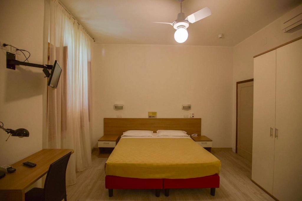 Postel nebo postele na pokoji v ubytování Albergo Le Sorgenti