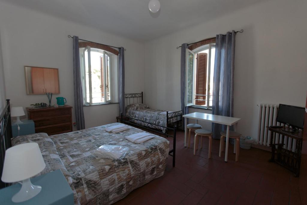 Postel nebo postele na pokoji v ubytování Magnolia Comfort & Rooms