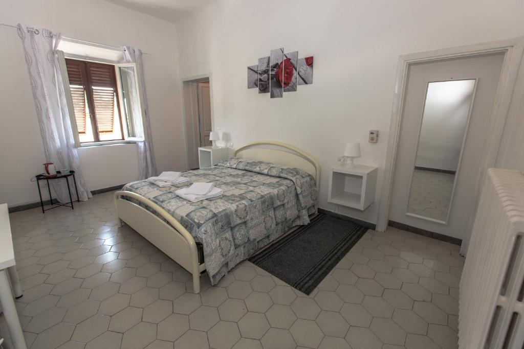 Postel nebo postele na pokoji v ubytování Magnolia Comfort & Rooms