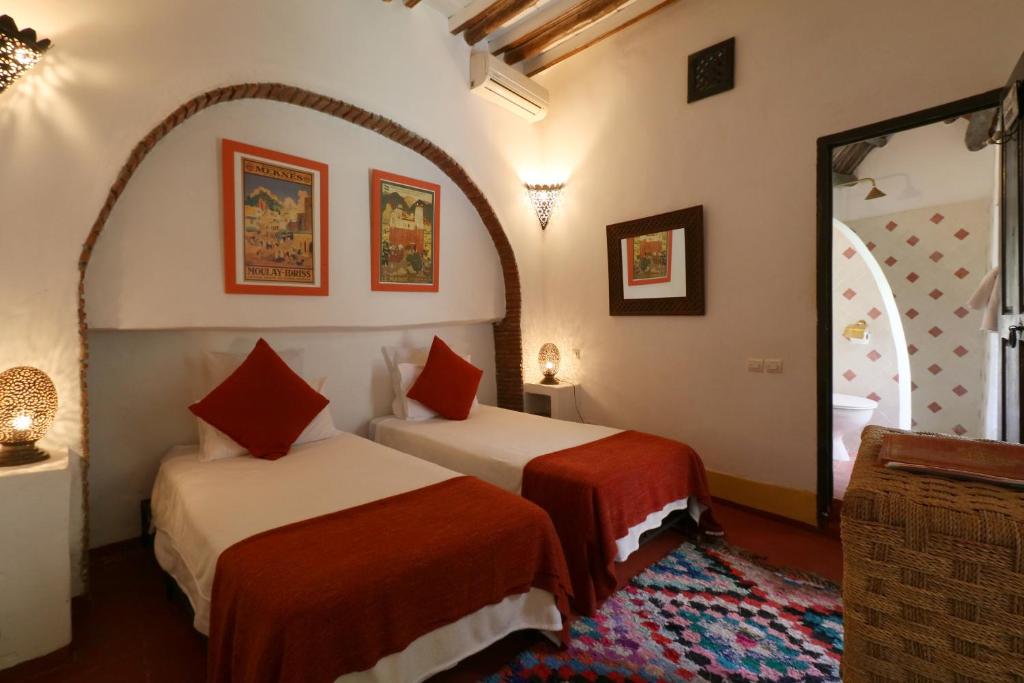 Postel nebo postele na pokoji v ubytování Riad Merstane Marrakech