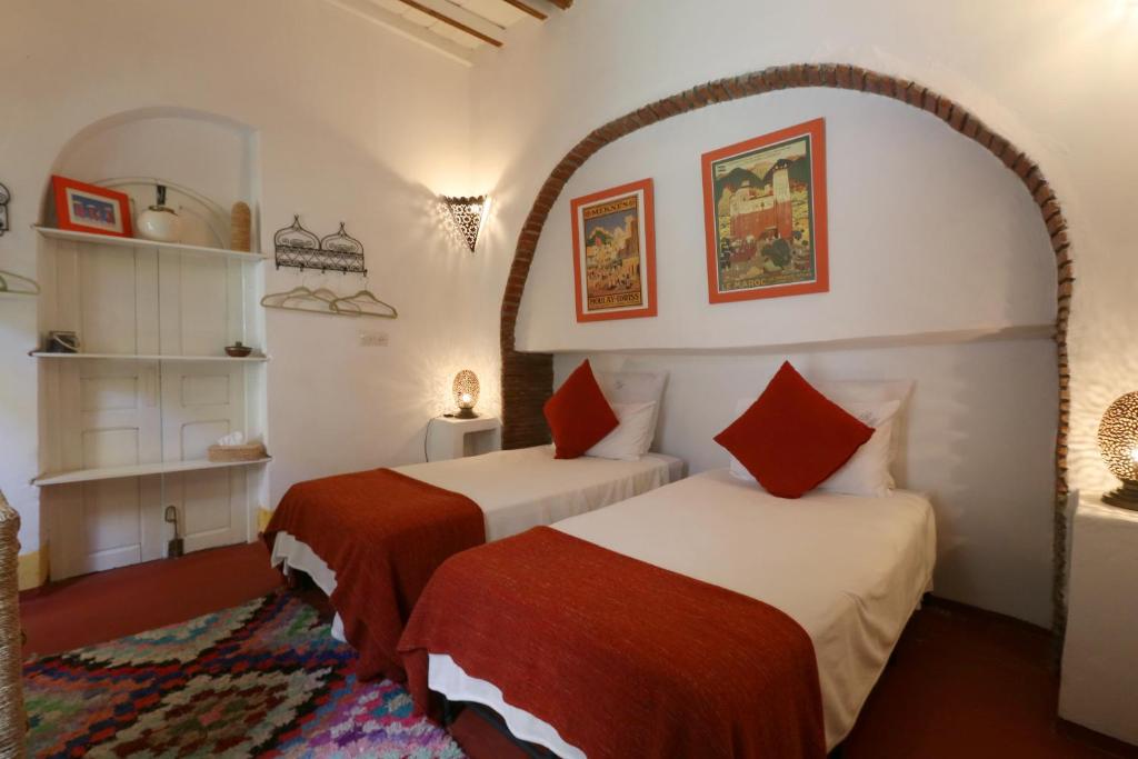 Postel nebo postele na pokoji v ubytování Riad Merstane Marrakech