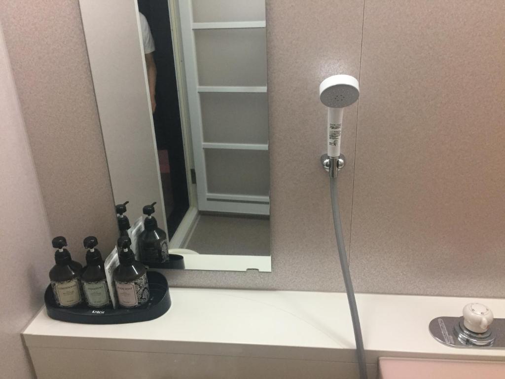 ホテルさんご (大人専用)にあるバスルーム