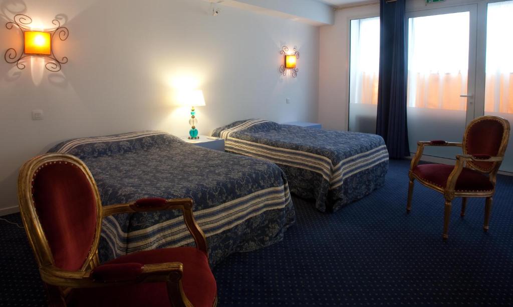 Rúm í herbergi á Hostel20 Toulouse Wilson
