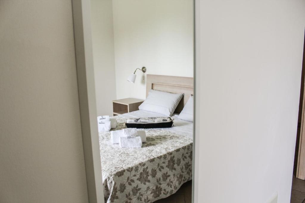 Posteľ alebo postele v izbe v ubytovaní B&B al Doremi