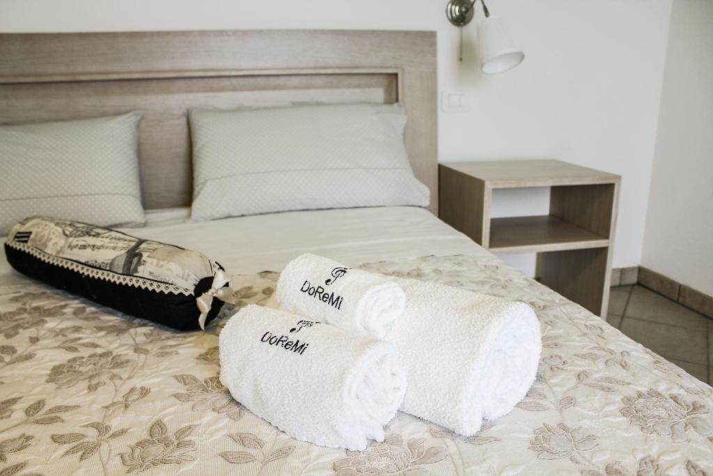 Posteľ alebo postele v izbe v ubytovaní B&B al Doremi