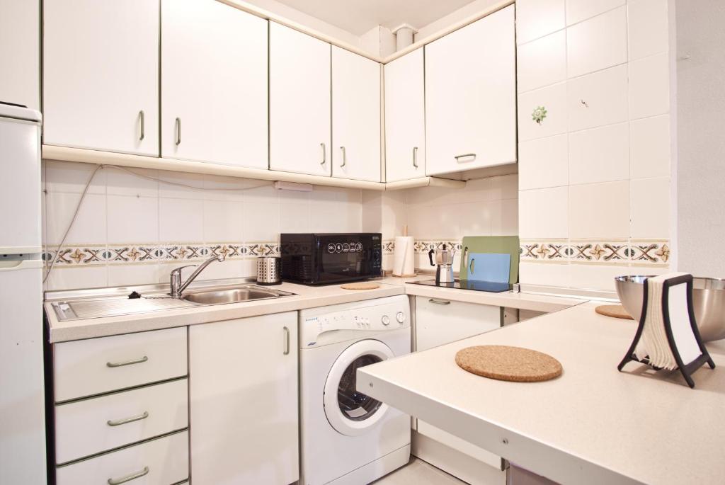 A kitchen or kitchenette at Pureza Oasis Suite