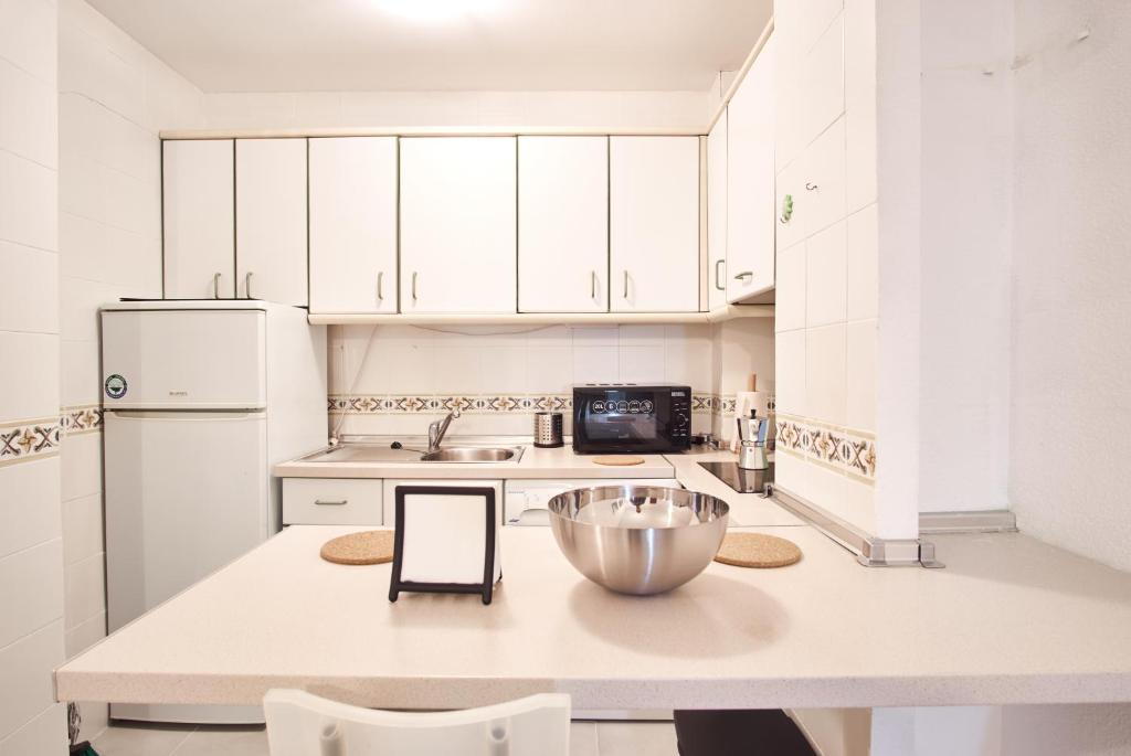 A kitchen or kitchenette at Pureza Oasis Suite