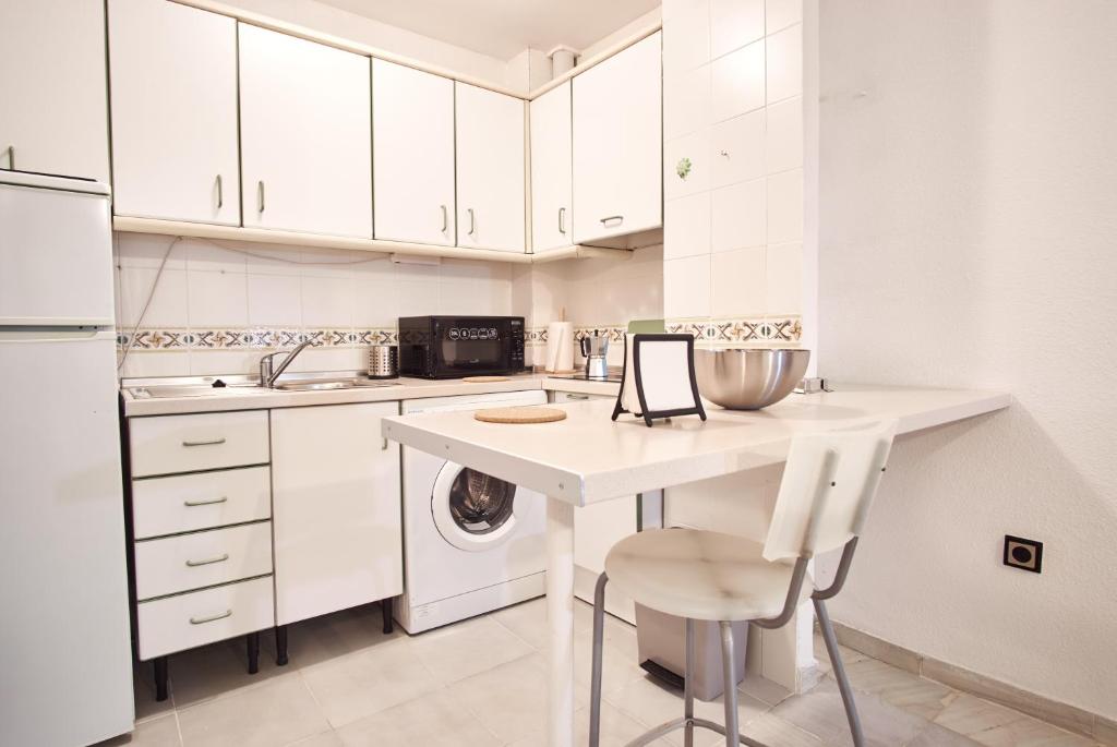 A kitchen or kitchenette at Pureza Oasis Suite