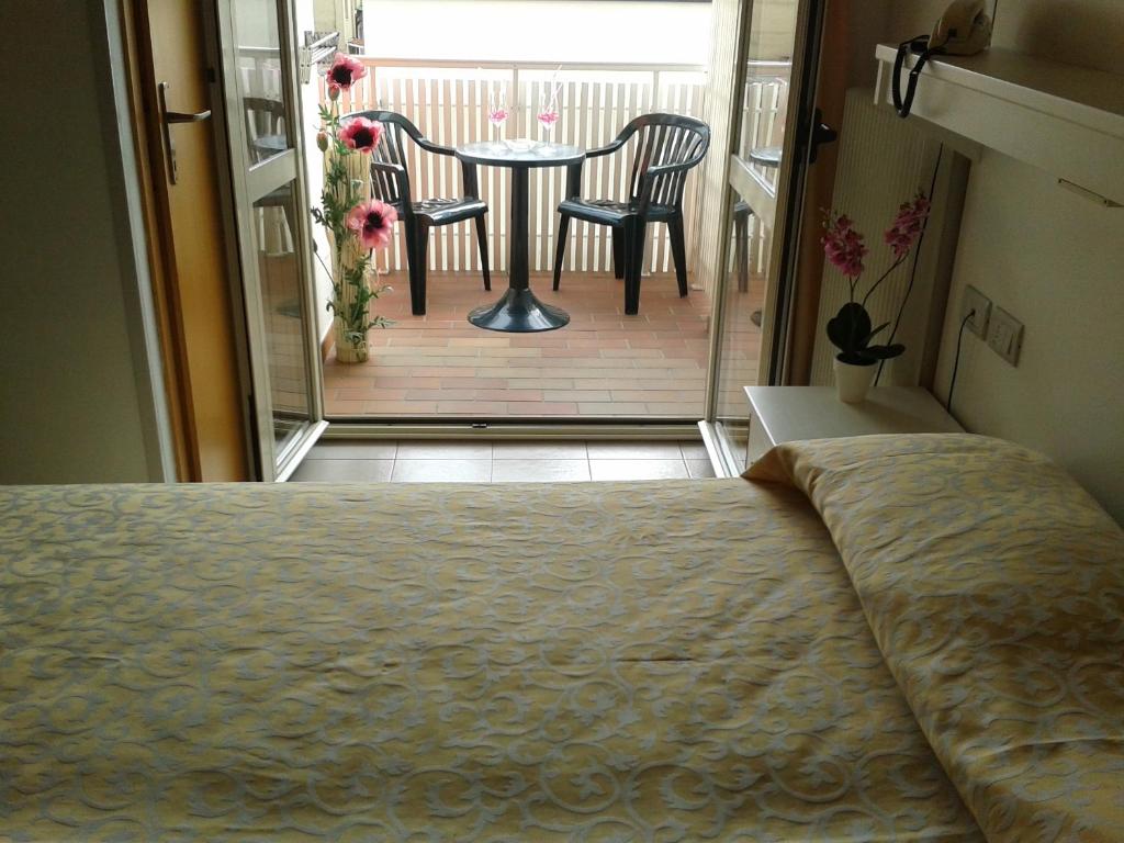 Postel nebo postele na pokoji v ubytování Hotel Paron