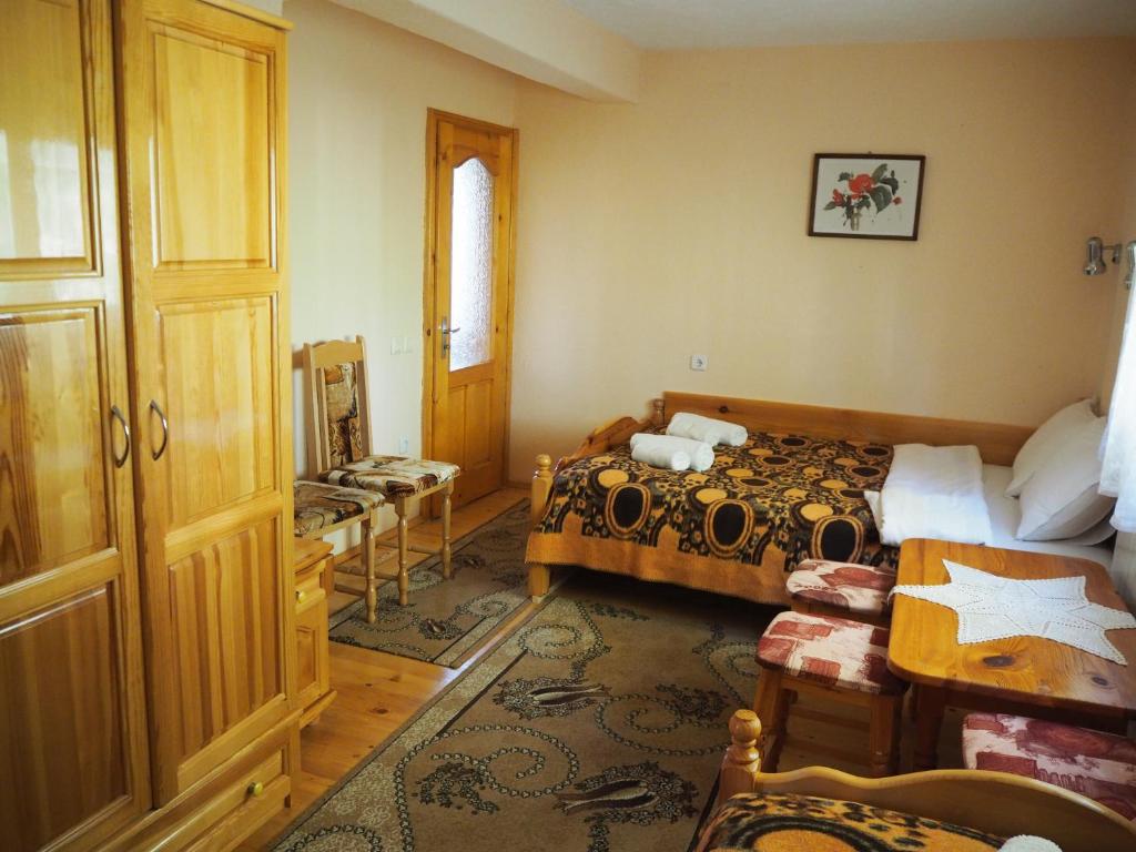 Postel nebo postele na pokoji v ubytování Орбелус
