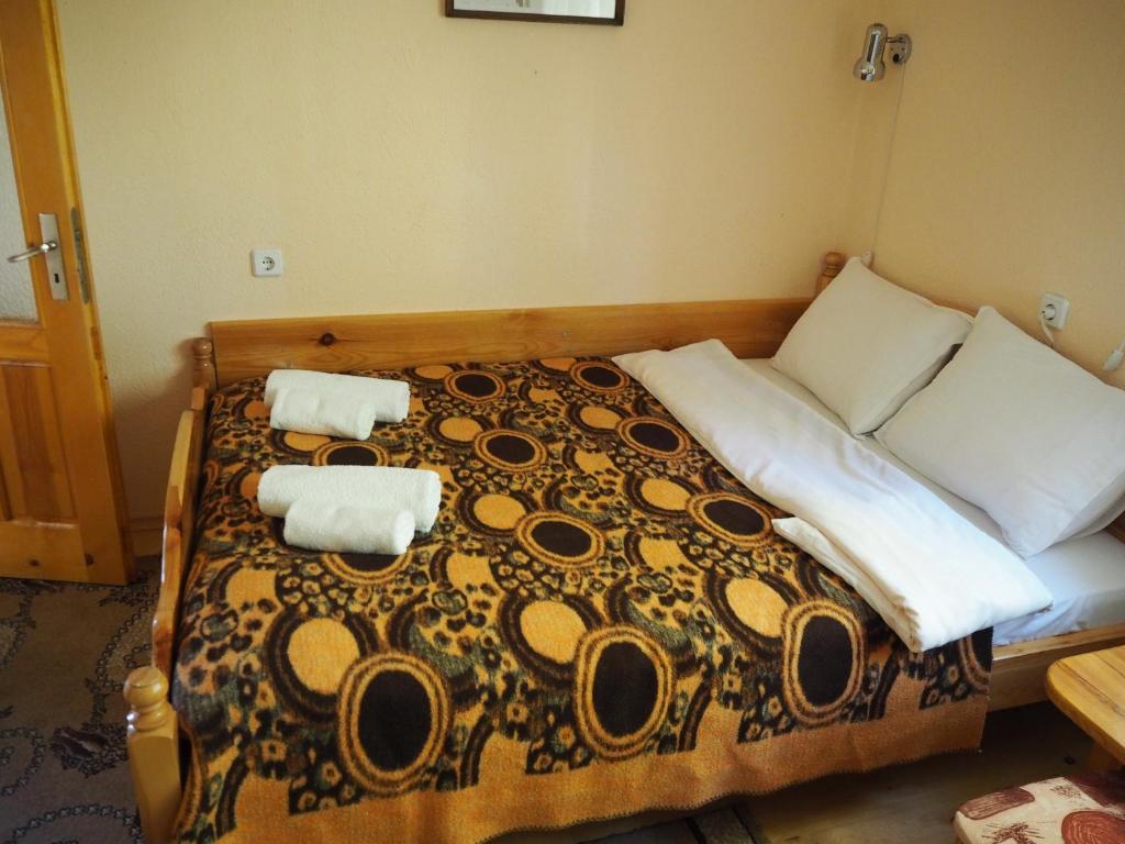 Postel nebo postele na pokoji v ubytování Орбелус