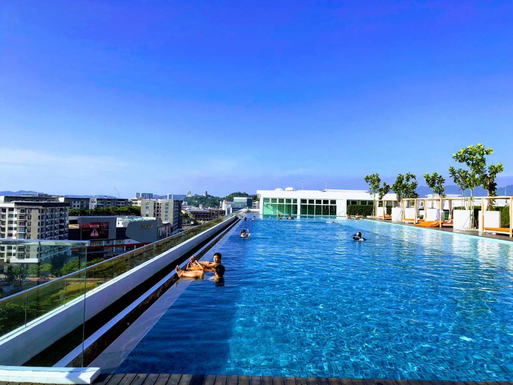 a swimming pool on the roof of a building at Utopian Homes at Sutera Avenue in Kota Kinabalu