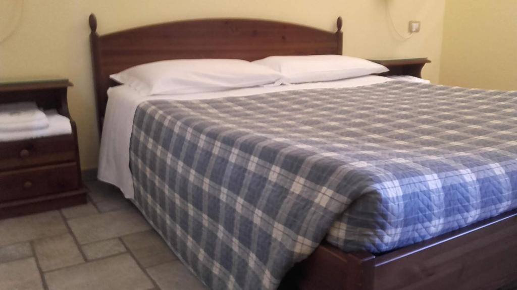 Postel nebo postele na pokoji v ubytování AGRITURISMO Casa Riz