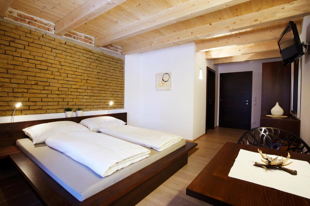 Postel nebo postele na pokoji v ubytování Brucknergut