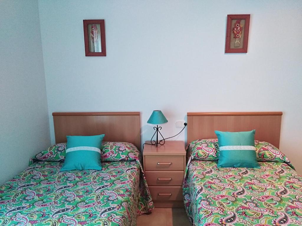 Posteľ alebo postele v izbe v ubytovaní Casa Adosada Entre Almendros
