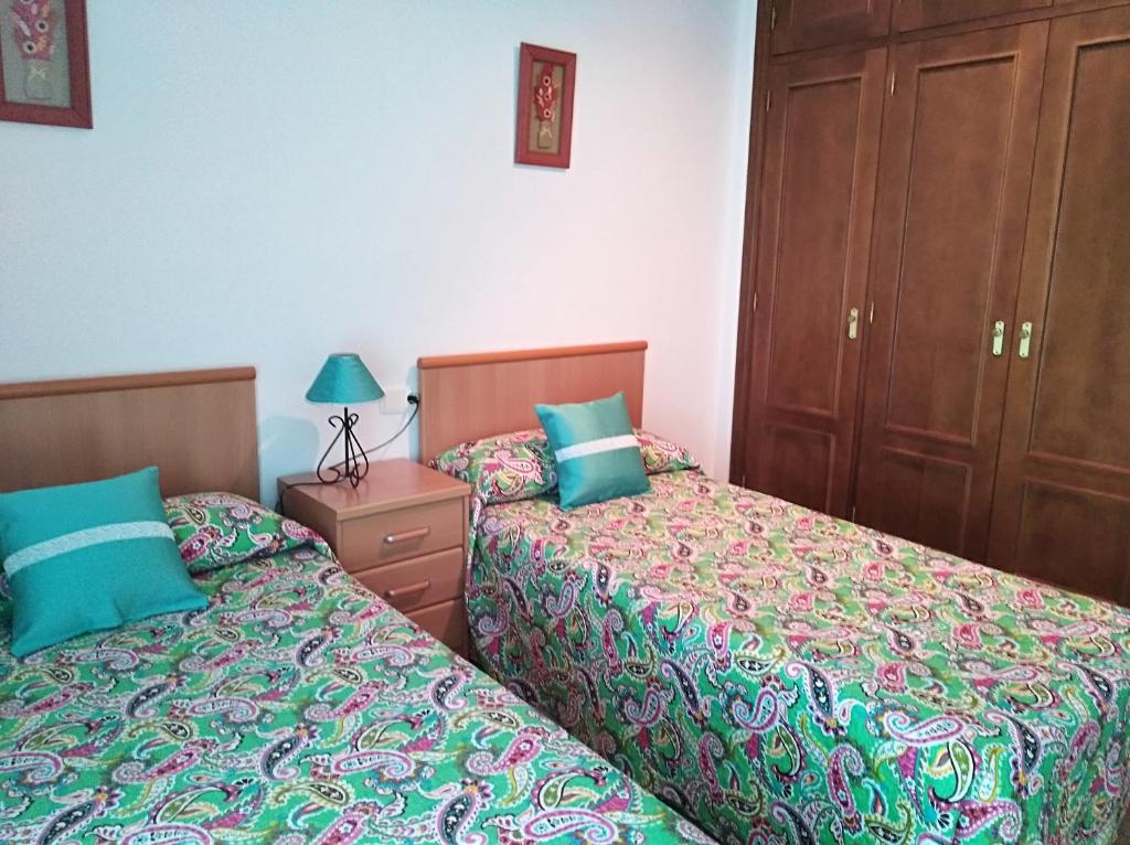 Posteľ alebo postele v izbe v ubytovaní Casa Adosada Entre Almendros