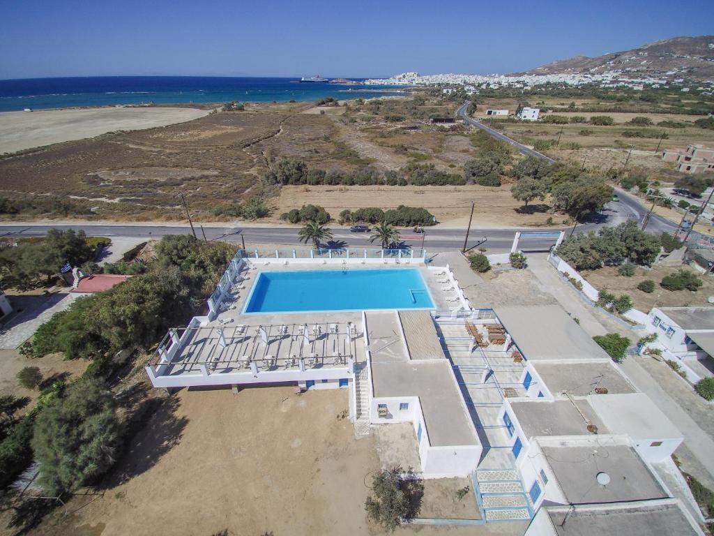 an aerial view of a villa with a swimming pool at Hostel Naxos Camping in Naxos Chora