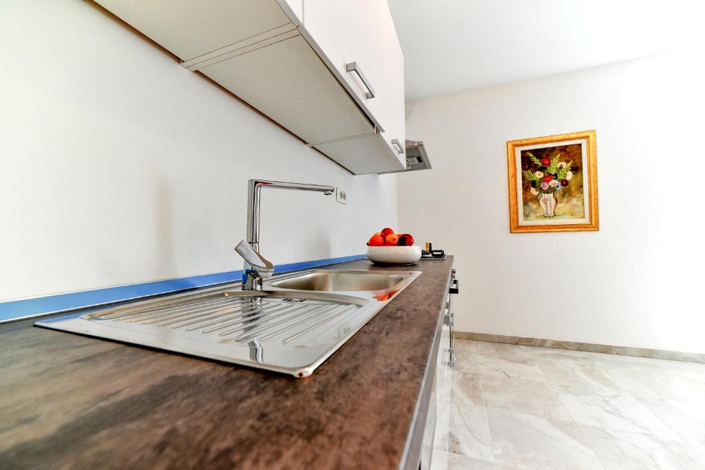Kuchyň nebo kuchyňský kout v ubytování Apartman Hertz