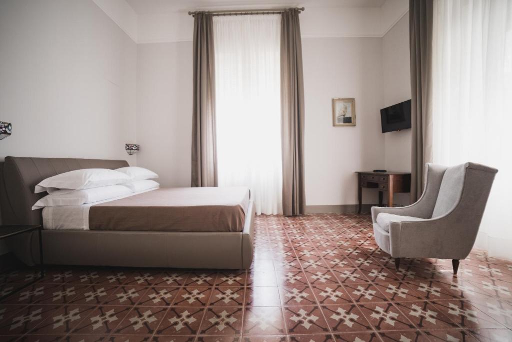 Letto o letti in una camera di Villa Giordanelli
